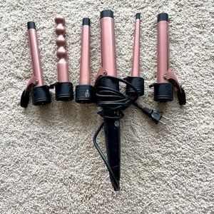 Curling iron with multiple attachments